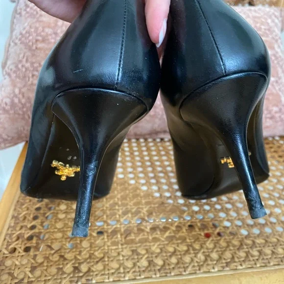 Prada Black Pointed-Toe Leather Pumps with Silver Circular Accent - Picture 6 of 7